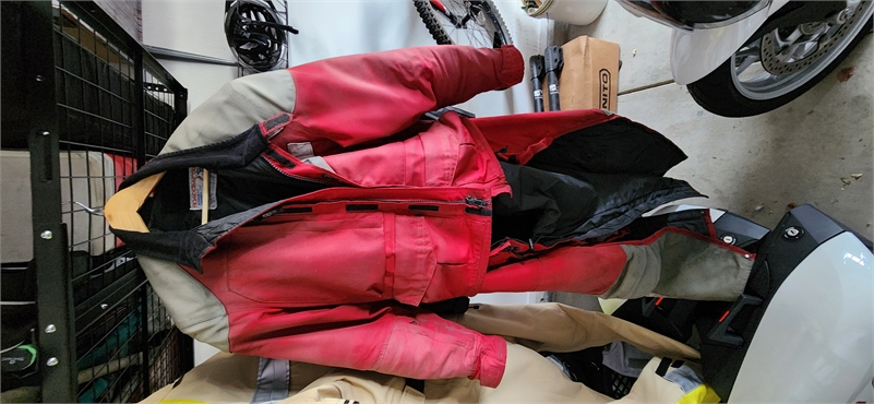 Was red now faded Aerostich 2 piece Roadcrafter suit